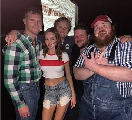Jared Keeso with his co-actors of Letterkenny